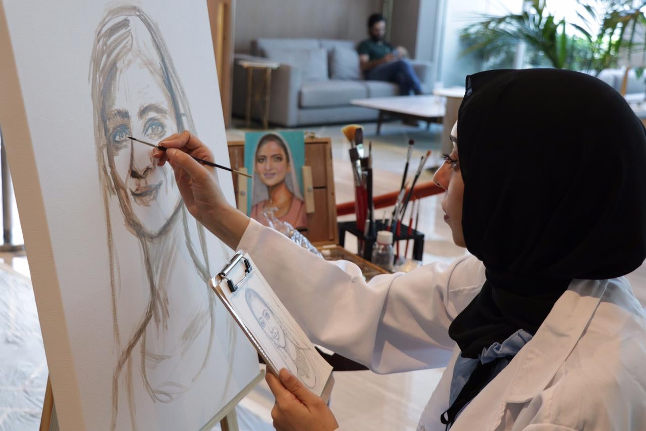 Live painting by artist Mai Majdy at «DusitD2 Kenz Hotel Art Week 2019»